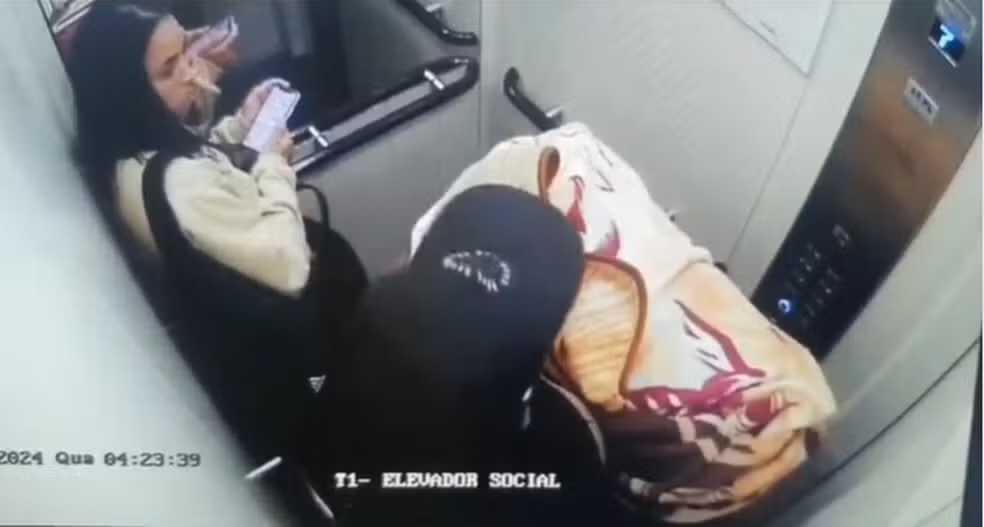 Casal mata mulher e sai de prédio com corpo em mala